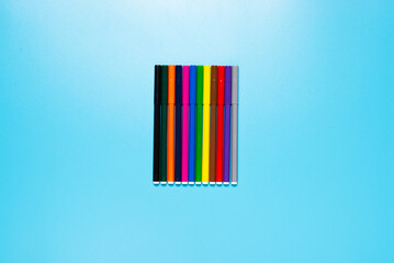 pencils on blue background