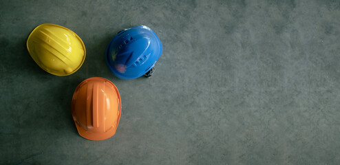 Multicolored Safety Construction Worker Hats. Teamwork of the construction team must have quality....