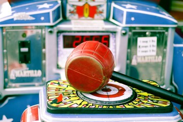 Test your strength. Amusement park. Carnival amusement park. Arcade game machine. Device for entertainment. Amusement for kids. Show your strength.