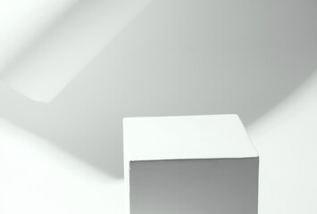 Fototapeta premium Empty podium on a white background. Monochrome