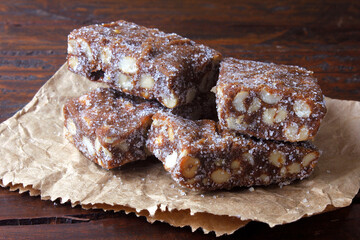 pe de moleque with chocolate is a typical Brazilian sweet made from a mixture of roasted peanuts and rapadura