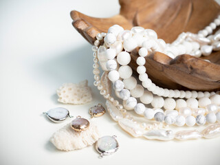Beads from semi-precious stones, pearls and mother-of-pearl