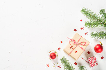 Christmas flat lay background with present box and decorations.