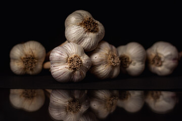garlic on black background