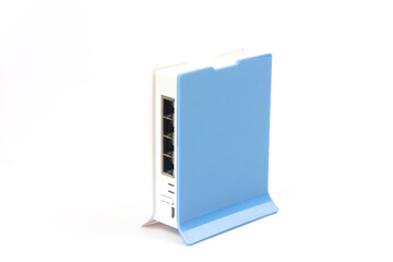Blue and white wireless internet router isolated on white background.