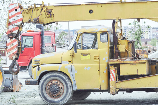 Heavy construction machines outdoors for public place reconstruction.