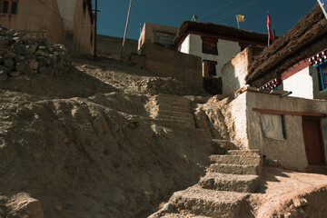 Stairs leading up to old houses in a HImalayan village