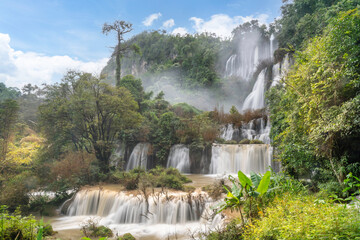 Long exposure photography of Tee Lor Su ( Thi Lo Su) waterfall with blue sky in Umphang, Tak, Thailand