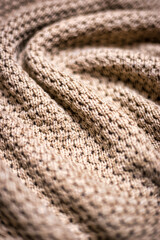 Knitted beige blanket texture