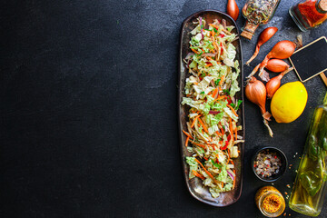 fresh salad vegetables Chinese cabbage, carrot, onion, pepper and more meal on the table tasty top view copy space for text food background rustic keto or paleo diet