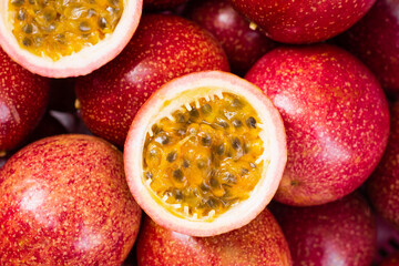 passion fruit ( Maracuya ) with green leaf and slice isolated on white background . top view.