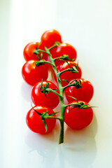 Fresh ripe cherry tomatoes on branche
