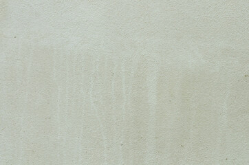 White stucco wall background. White painted cement wall texture