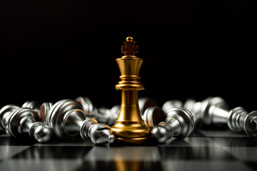 Golden King chess is last standing in the chess board, Concept of successful business leadership