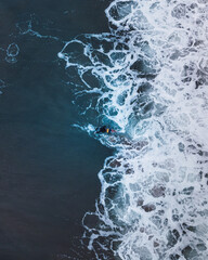 waves on the sea with a surfer 