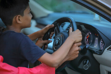 young indian farmer and little child with car