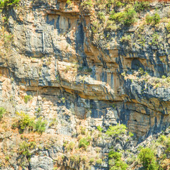 Fototapeta na wymiar Close up cliff of rock mountain background.
