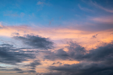 Naklejka na ściany i meble Beautiful colorful sky with clouds at sunset