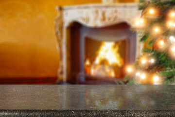 Desk of free space and fireplace in home interior 