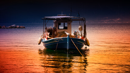 fishing boat at sunset