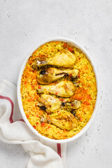 Chicken curry rice casserole in baking dish. Space for text, top view.