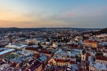 Fototapeta na wymiar View on historic center of the Lviv at sunset. View on Lvov cityscape from the town hall