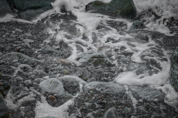 Nice view of the ground full of small stones in the sea