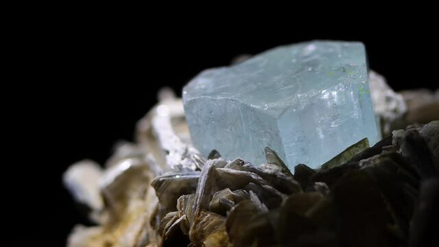 A macro detail shot of an aquamarine crystal. Sample was found in Argentina.  The color and prismatic qualities are apparent.