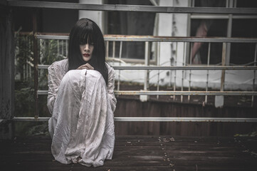 Portrait of asian woman make up ghost,Scary horror scene for background,Halloween festival...