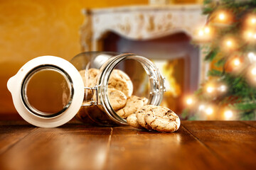 Fototapeta na wymiar chrismtas cookies on desk and fireplace 