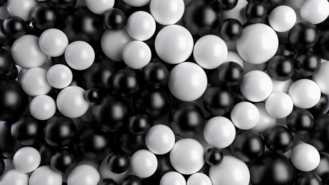Black and white balls fill the screen. Spheres fill the volume. Dragee or pills. 3D render. © garrykillian