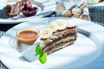 Delicious banana dessert on a white plate.