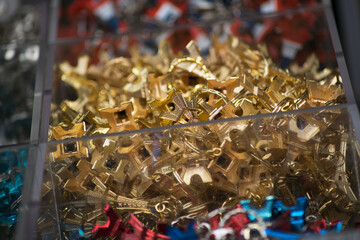 Closeup of miniatture Eiffel towers for sale in the street