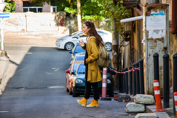 Woman in the casual cloth in the street, autumn