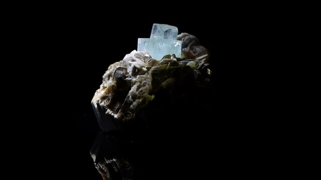 A stunning double crystal of Argentinian aquamarine in a matrix of muscovite.