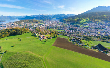 Fototapeta na wymiar Kriens village, canton of Lucerne. Switzerland. Pilatus peak. Aerial view. City skyline and village landscape