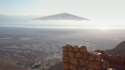 3d rendering, Large Triangle alien ufo over sea and desert mountains-Aerial © ImageBank4U