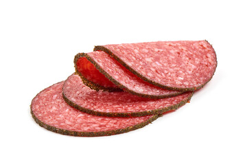 Sliced Salami with spices, isolated on white background