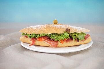 sandwich with ham and vegetables