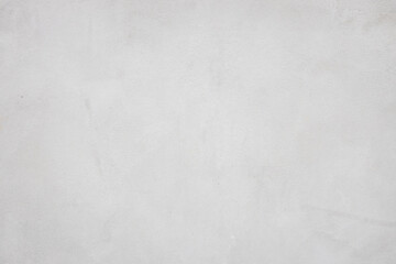 Cement wall background textured in natural color with copy space.
