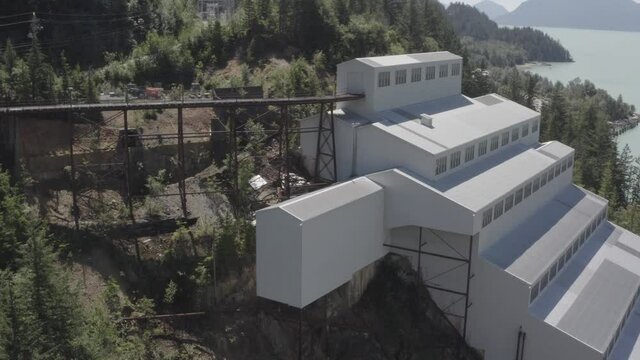 BC Britannia Mine Museum Howe Sound Squamish off the highway Aerial side view rail tracks into the multi teir award winning building over 10 acres of historic isnpired sights for the whole family 1-2