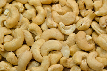 Cashew nuts. Cashew kernels. Clean organic nuts retro background. Organic healthy food.