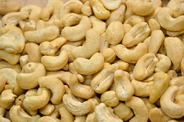 Cashew nuts. Cashew kernels. Clean organic nuts retro background. Organic healthy food.