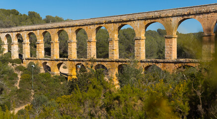Fototapeta premium Tarragona famous bridge Puento del diablo at sunny day view, Spain..