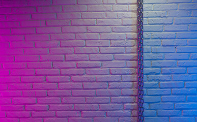 white brick wall texture with chain in neon light