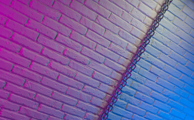 white brick wall texture with chain in neon light