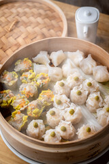 chinese steamed shumai in bamboo steamer