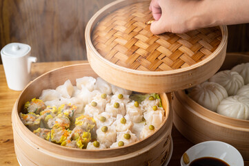 chinese steamed shumai in bamboo steamer