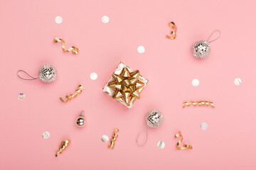 Christmas holiday greeting card template on pink paper background.