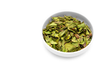 Leafy natural green tea on a white background